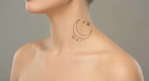 fine line moon tattoo on the neck