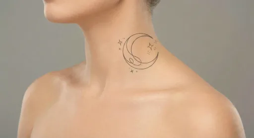 minimal moon tattoo on the neck